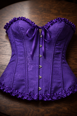 Corsé Rosalind Morado oscuro – sobre mesa de madera